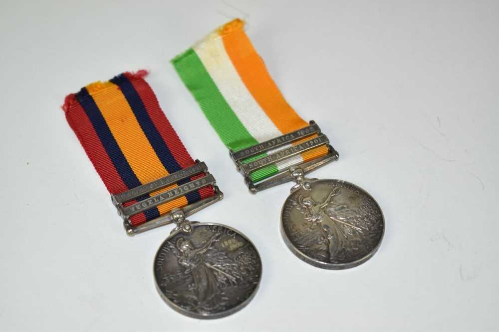 Lot 733 - Boer War medal pair comprising Queen South Africa medal with two clasps, Tugela Heights and Relief of Ladysmith, together with King's South Africa medal with two clasps, South Africa 1901 and South...