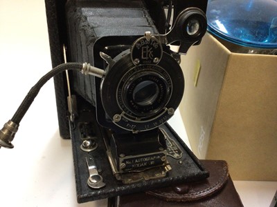 Lot 2365 - Group of cameras and accessories, including a Mamiya Super 16, Minox, Kodak Autographic, light meters, flash bulbs, etc