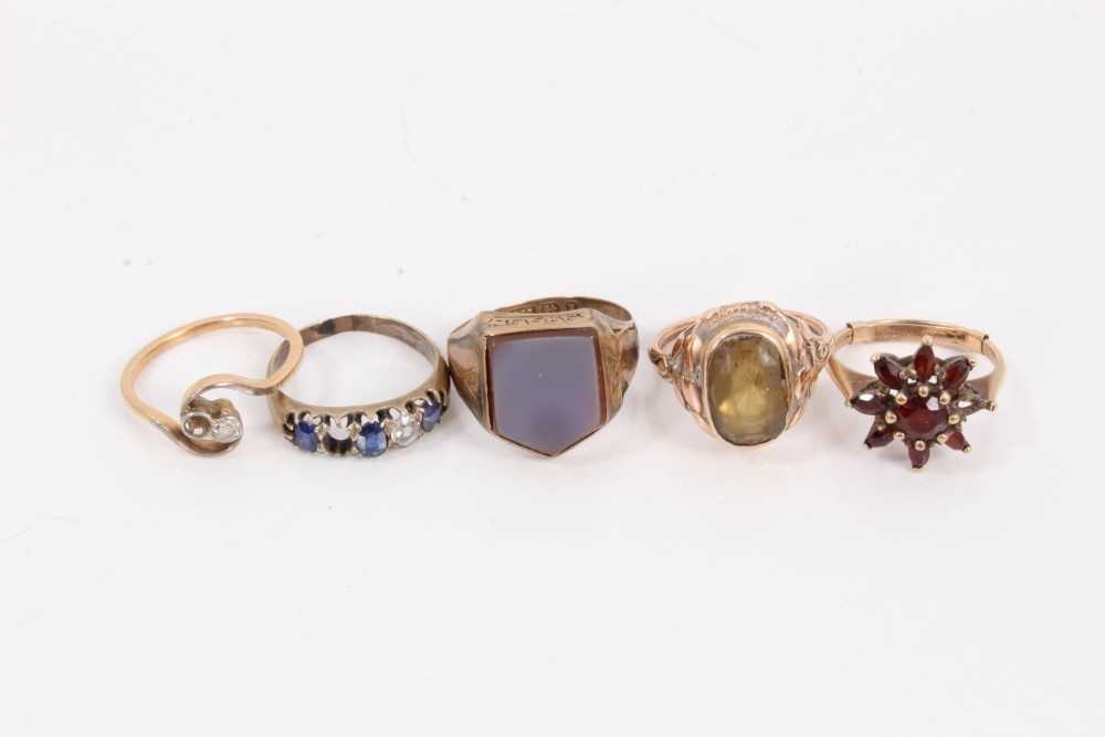 Lot 104 - 9ct gold hard stone shield signet ring, 9ct gold garnet cluster ring, gem set ring, diamond and sapphire ring, one other diamond ring (5)