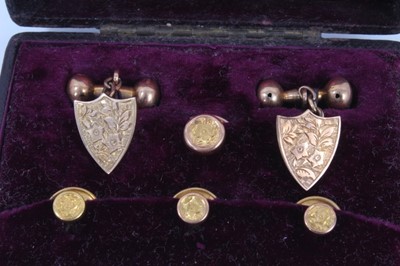 Lot 109 - Set of 9ct gold antique dress studs and pair of shield shaped cufflinks, in fitted case