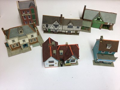 Lot 1887 - Selection of constructed Hornby model buildings plus cardboard houses, churches and other buildings (2 boxes)