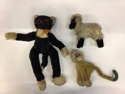 Lot 643 - Vintage Steiff toys including fox 1542/35, Steiff black cat with orange eyes and red stitched nose, blue and yellow monkey,small bear and other toys to include a  tiger..