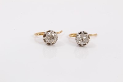 Lot 117 - Pair of antique diamond single stone earrings, each with an old cut diamond