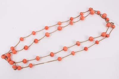 Lot 124 - Antique 9ct gold and coral long necklace