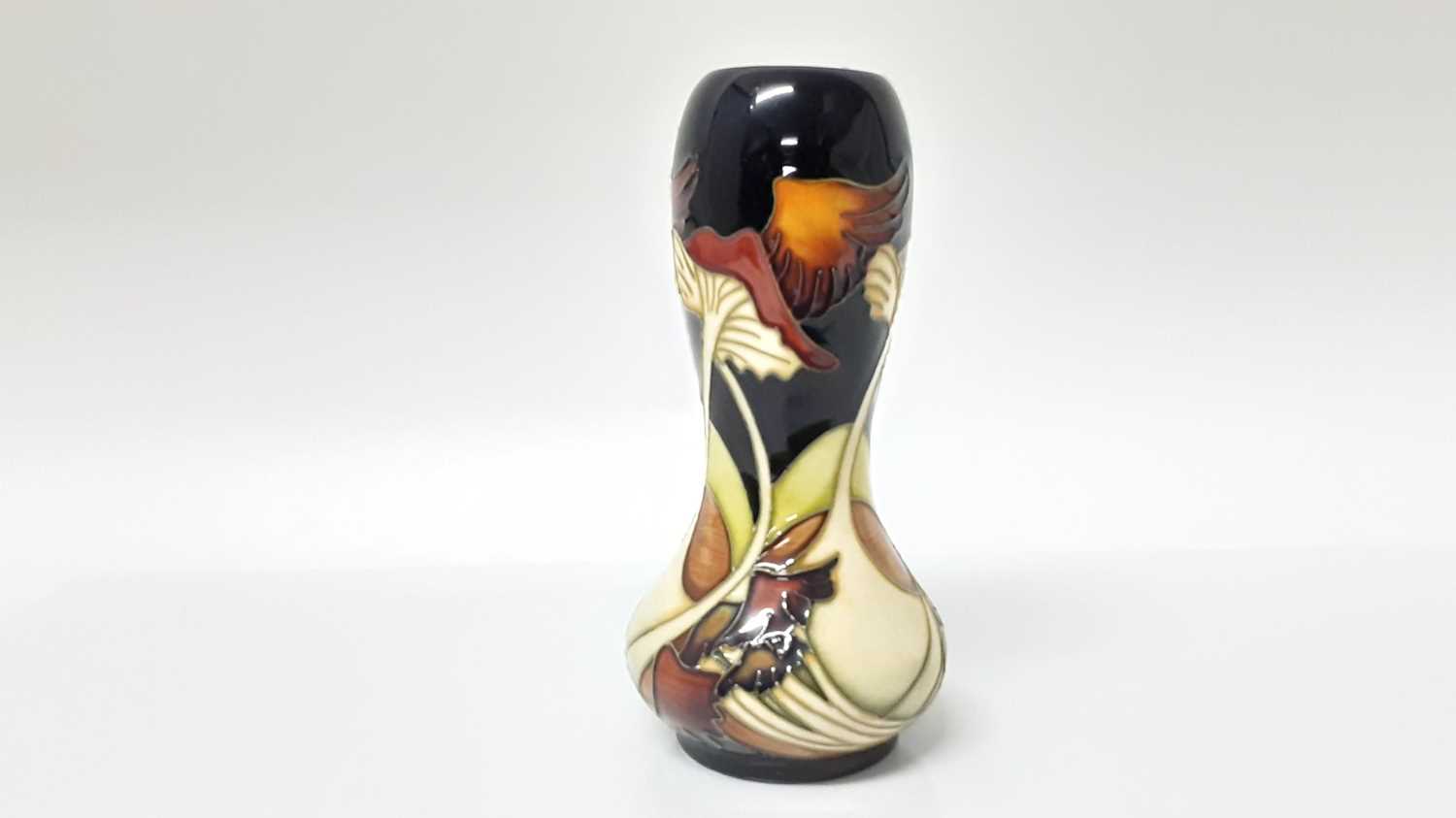 Lot 1337 - Moorcroft pottery vase decorated in the Parasol Dance pattern