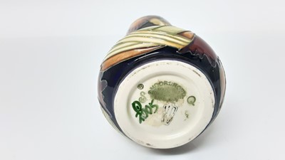 Lot 1337 - Moorcroft pottery vase decorated in the Parasol Dance pattern