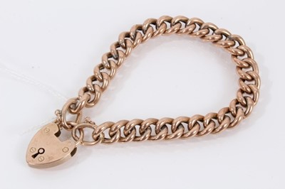 Lot 483 - Edwardian 9ct rose gold curb link bracelet with padlock clasp