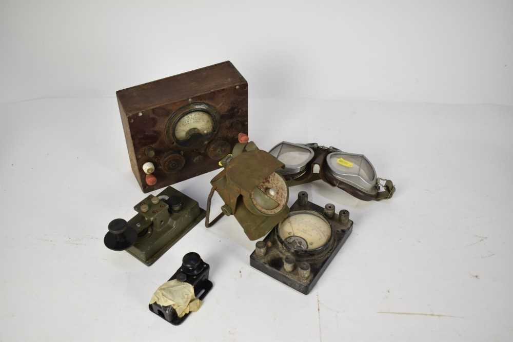 Lot 819 - Second World War ARP bicycle lamp, flying goggles and morse code tappers.