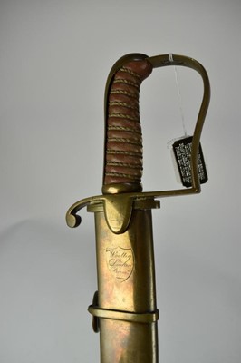 Lot 910 - Unusual Georgian 1796 Pattern Yeomanry cavalry sabre by Woolley and Deakin ,Birmingham with brass stirrup hilt and brass scabbard, engraved on langet and at chape 'ELCN', with curved fullered blade...