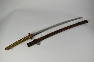 Lot 916 - Good quality Second World War Japanese Officers Katana sword with regulation mounts with silver Mon badge to pommel, signed tang with leather cover to lacquered wood scabbard , with modern engraved...