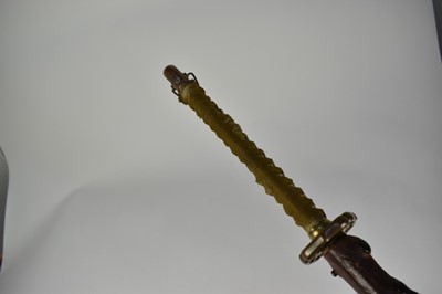 Lot 916 - Good quality Second World War Japanese Officers Katana sword with regulation mounts with silver Mon badge to pommel, signed tang with leather cover to lacquered wood scabbard , with modern engraved...