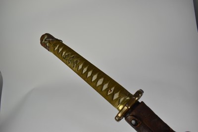 Lot 916 - Good quality Second World War Japanese Officers Katana sword with regulation mounts with silver Mon badge to pommel, signed tang with leather cover to lacquered wood scabbard , with modern engraved...