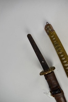 Lot 916 - Good quality Second World War Japanese Officers Katana sword with regulation mounts with silver Mon badge to pommel, signed tang with leather cover to lacquered wood scabbard , with modern engraved...