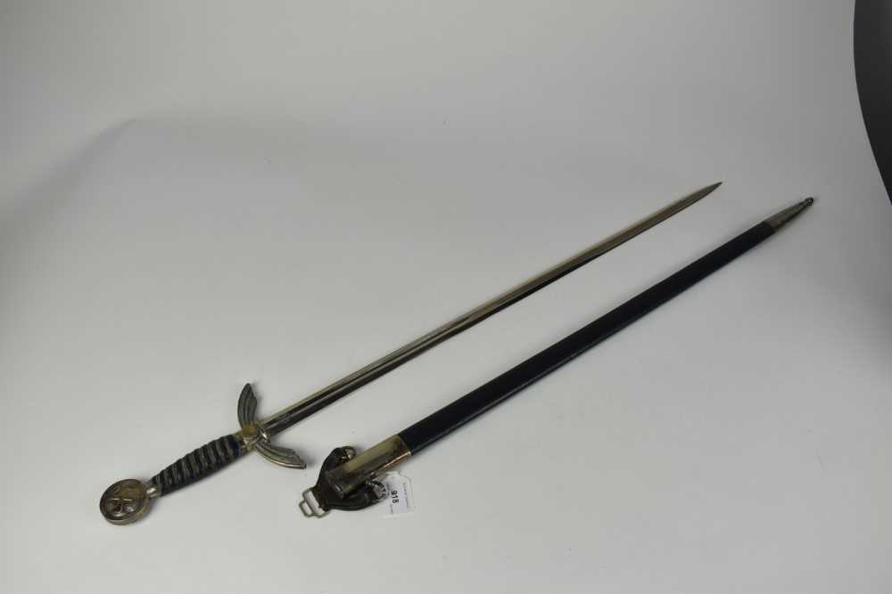 Lot 918 - 1930s Nazi Luftwaffe Officers sword by E & F Horster, Berlin with silver plated hilt and wire bound blue leather grip, double edged blade retaining all original polish, in original blue leather cov...