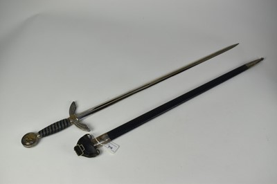 Lot 918 - 1930s Nazi Luftwaffe Officers sword by E & F Horster, Berlin with silver plated hilt and wire bound blue leather grip, double edged blade retaining all original polish, in original blue leather cov...