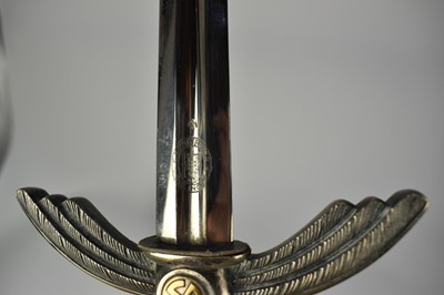 Lot 918 - 1930s Nazi Luftwaffe Officers sword by E & F Horster, Berlin with silver plated hilt and wire bound blue leather grip, double edged blade retaining all original polish, in original blue leather cov...