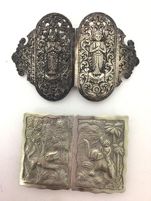 Lot 178 - Two Eastern white metal buckles