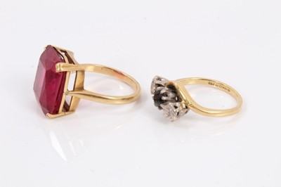 Lot 181 - 18ct gold sapphire and diamond three stone cross over ring and 18ct gold pink stone cocktail ring