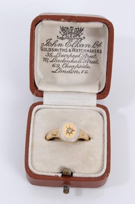Lot 186 - 18ct gold diamond signet ring with a gypsy set single stone diamond with platinum border