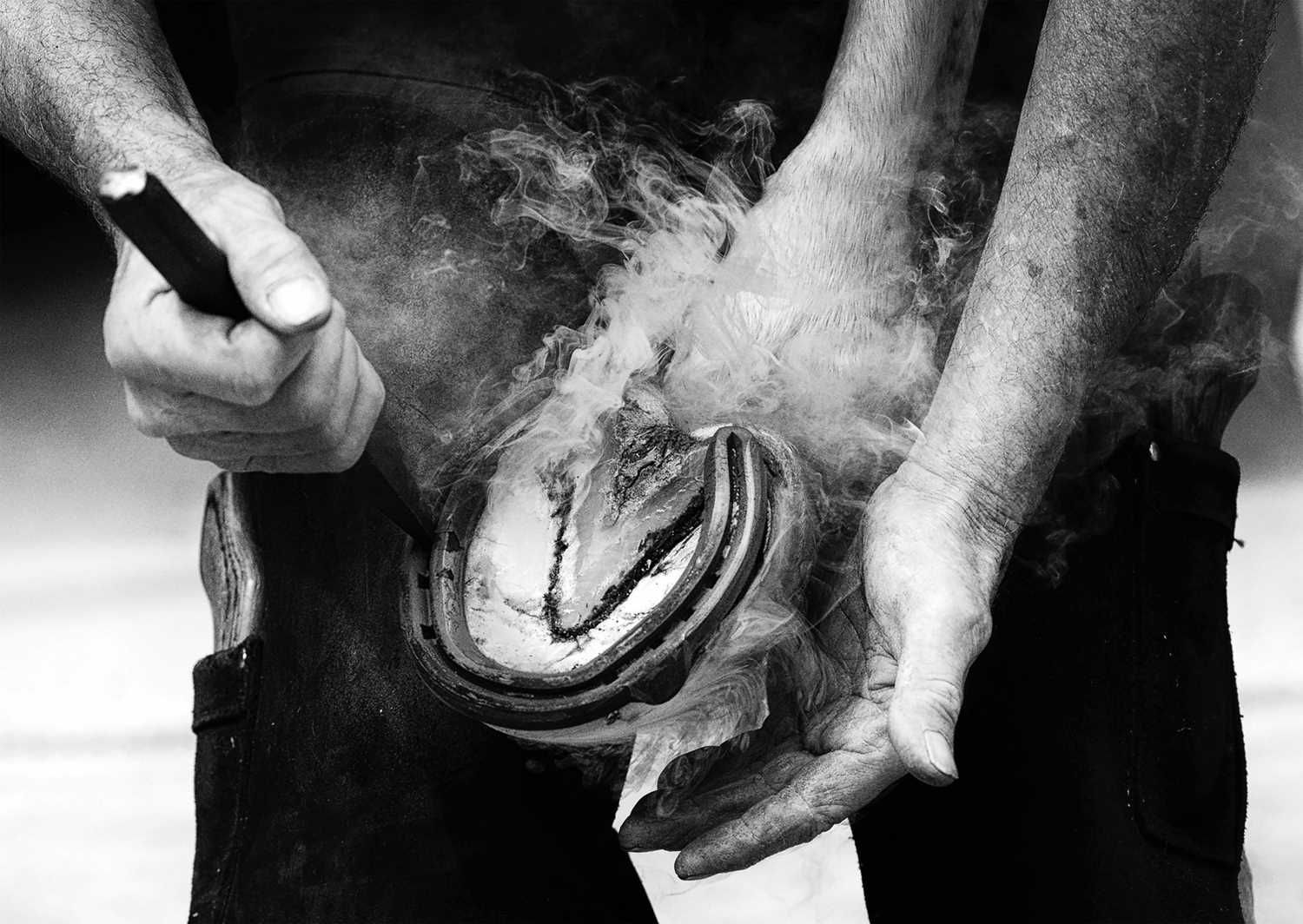 Lot 40 - Jayne Odell black and white photographic print, 'Hot shoeing', 100cm x 71cm