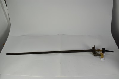 Lot 947 - Late 18th/ early 19th century Indian Firangi broad sword with steel bowl guard and long spur mount, straight multi fullered blade 116 cm overall