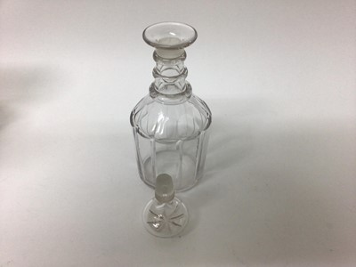Lot 25 - Pair of 19th century glass decanters with triple ring necks and mushroom stoppers, together with another similar (3)