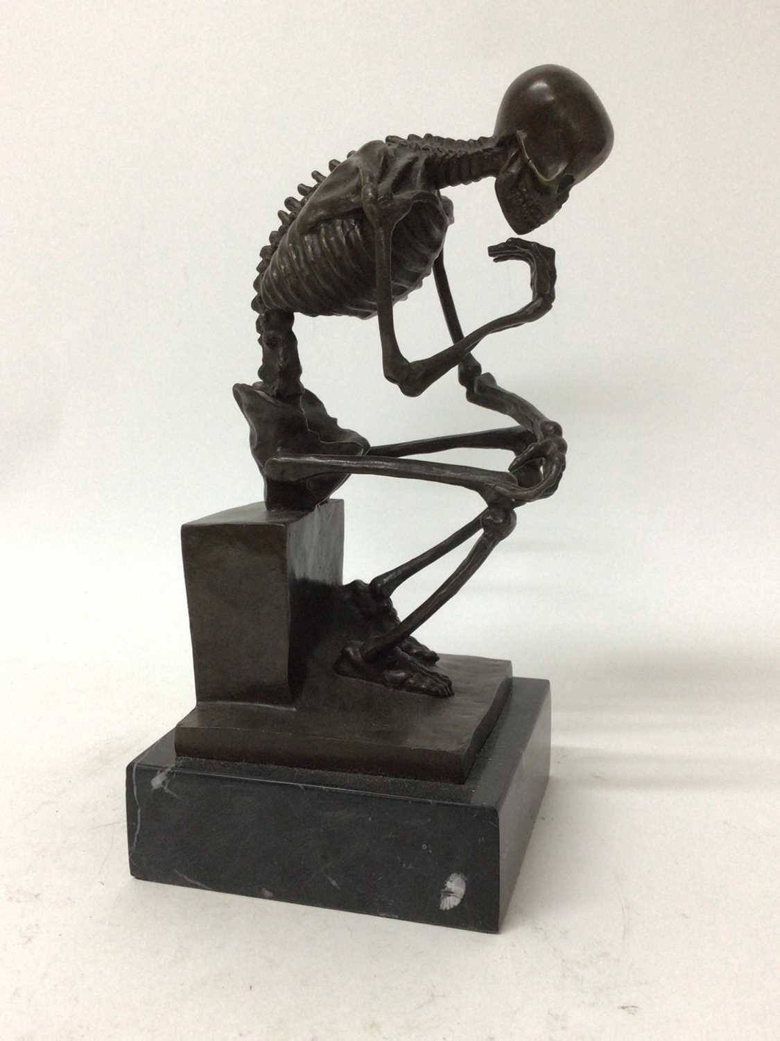 Lot 51 - Bronze sculpture of a skeleton