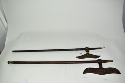 Lot 958 - 19th century Indian fighting axe with re-curving head and brass and hide mounts 88 cm