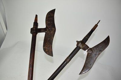 Lot 958 - 19th century Indian fighting axe with re-curving head and brass and hide mounts 88 cm