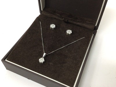 Lot 164 - Diamond cluster pendant necklace and matching earrings, each with a daisy flower head cluster of brilliant cut diamonds in 9ct white gold setting
