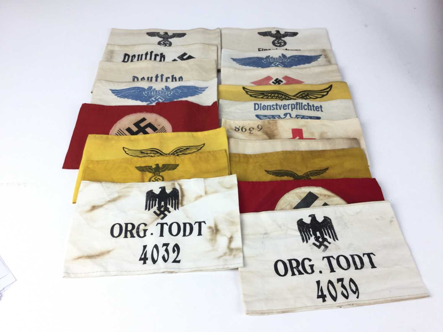 Lot 840 - Collection of seventeen Post War replica Nazi arm bands (17)