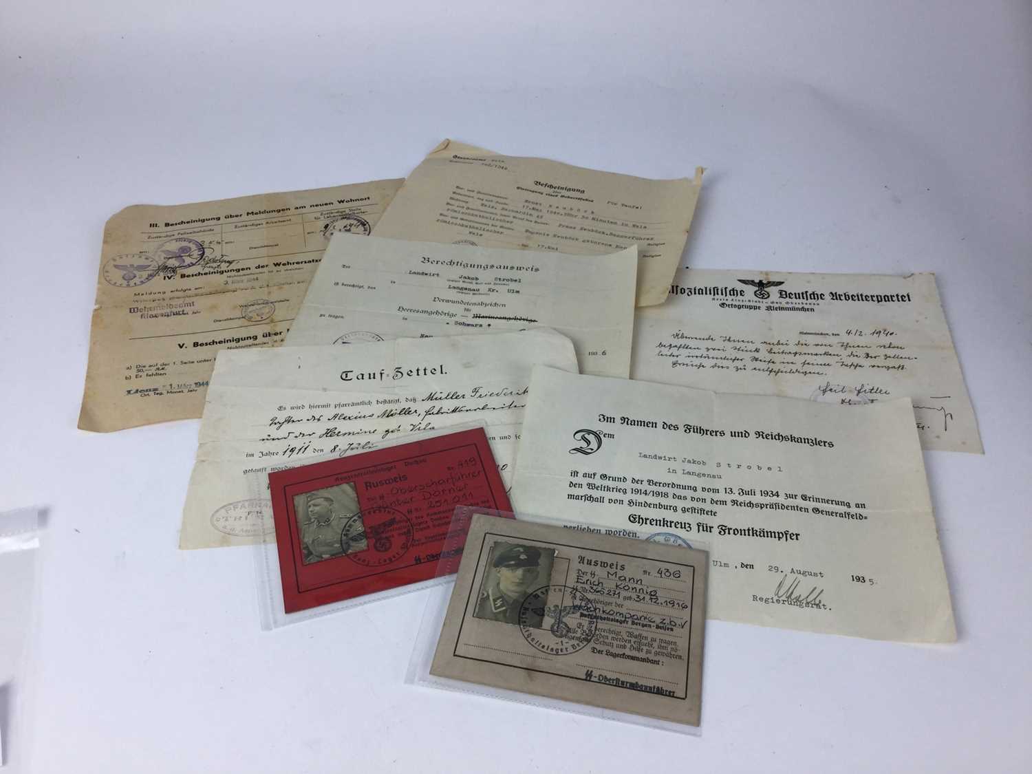 Lot 844 - Small group of Nazi documents including soliders identity papers, certificate and others.