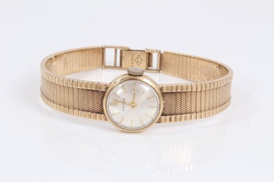 Lot 233 - Ladies vintage Invicta 9ct gold cased wristwatch on 9ct gold bracelet