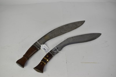 Lot 916 - Early 20th century Gurka military Kukri and post -war Kukri , scabbards lacking (2)