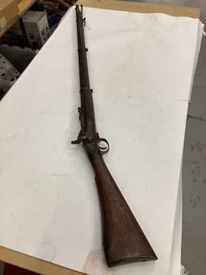 Lot 992 - Victorian Snider rifle with Enfield lock dated 1864, Snider breach conversion, with steel ramrod and three bands to barrel  138 cm overall