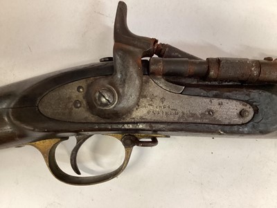 Lot 992 - Victorian Snider rifle with Enfield lock dated 1864, Snider breach conversion, with steel ramrod and three bands to barrel  138 cm overall