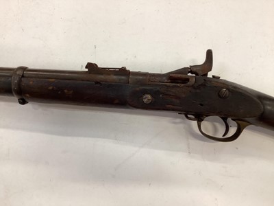 Lot 992 - Victorian Snider rifle with Enfield lock dated 1864, Snider breach conversion, with steel ramrod and three bands to barrel  138 cm overall