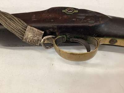 Lot 997 - 19th century Indian musket with Enfield lock dated 1878, V.R.I stamped stock with native decoration and alterations with decorative silver wire shoulder strap 142 cm