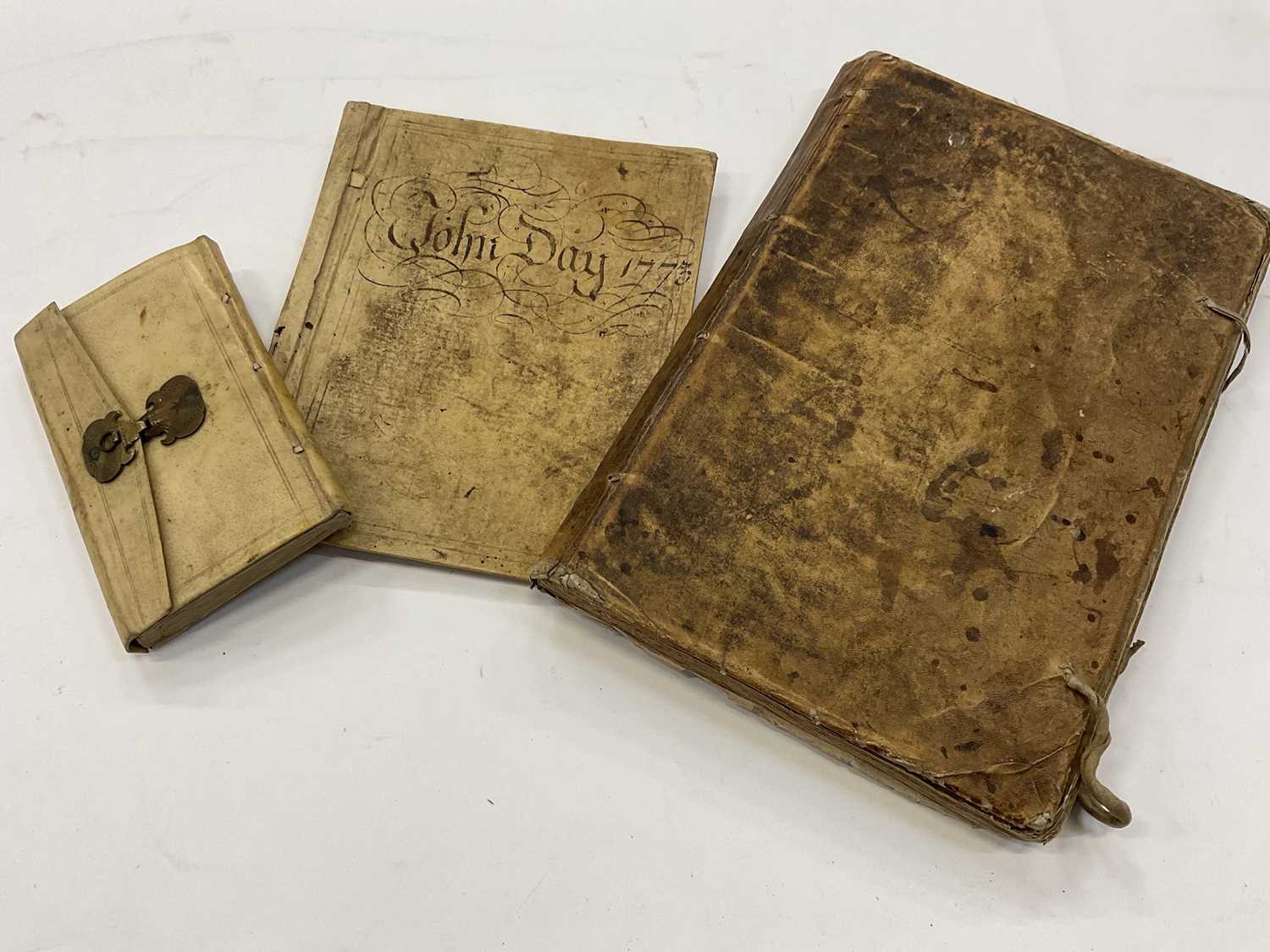 Lot 1681 - 17th century hand written inventory, two other vellum bound books