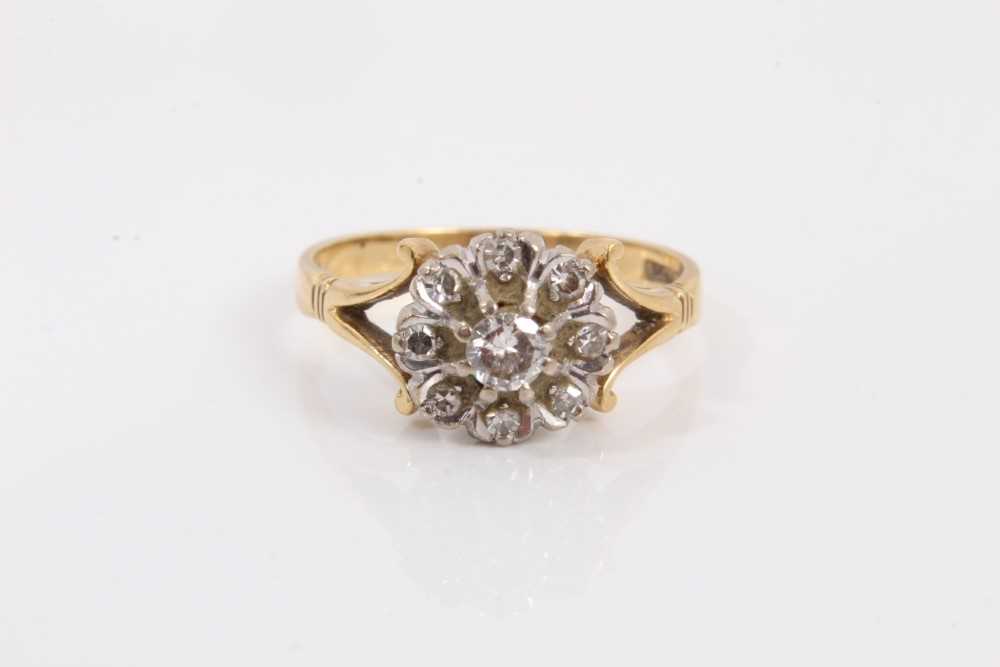 Lot 265 18ct gold diamond flower head cluster ring