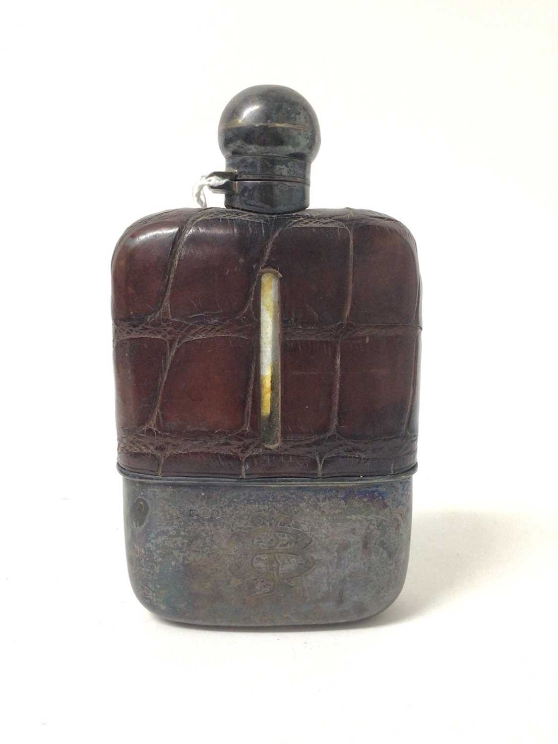 Lot 300 - George V silver hip flask, with crocodile leather covered body, bayonet fitting cap and removable drinking cup with engraved initial, (Sheffield 1918), maker Frederick C Asman & Co, 17cm in length.