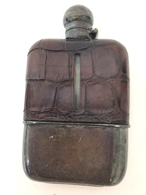 Lot 300 - George V silver hip flask, with crocodile leather covered body, bayonet fitting cap and removable drinking cup with engraved initial, (Sheffield 1918), maker Frederick C Asman & Co, 17cm in length.