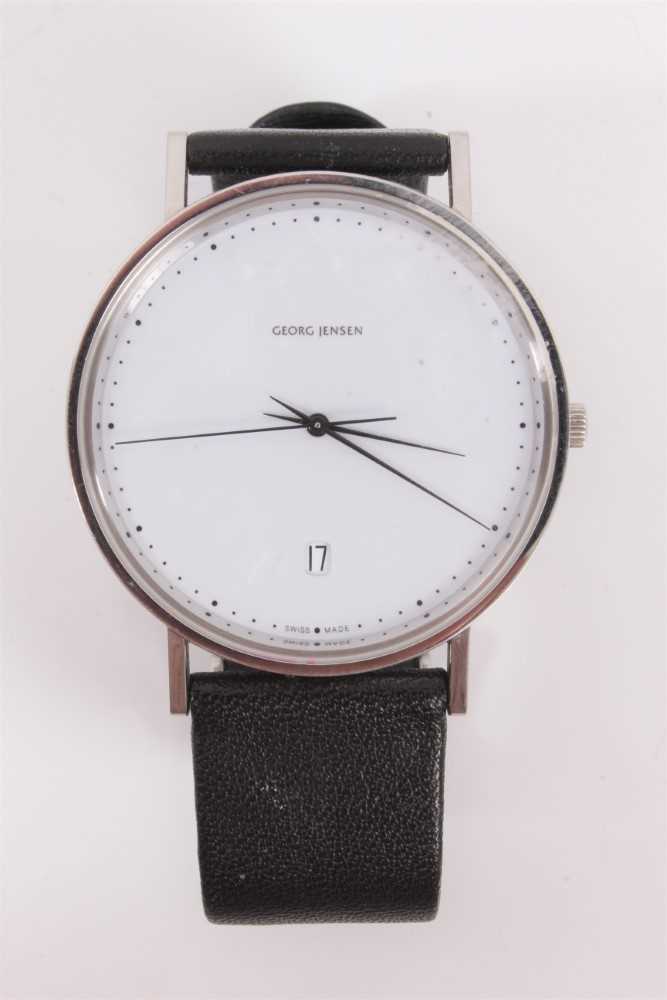 Lot 335 - Georg Jensen Koppel quartz wristwatch with white dial, dot markers and date aperture in stainless steel case, 37mm diameter, numbered 013148, on black calfskin strap