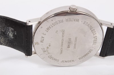 Lot 335 - Georg Jensen Koppel quartz wristwatch with white dial, dot markers and date aperture in stainless steel case, 37mm diameter, numbered 013148, on black calfskin strap