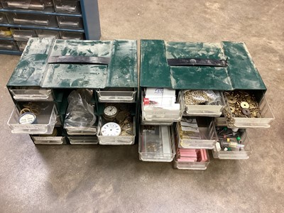 Lot 593 - Large collection of watch and clock components and tools, including stacking drawers of pocket watch parts and various other items.