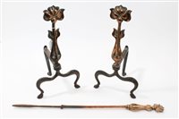 Lot 649 - Pair of Art Nouveau copper and steel fire dogs,...