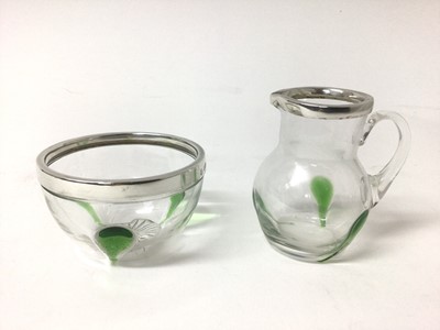 Lot 195 - Art Nouveau silver mounted glass cream jug and sugar bowl with applied green glass decoration, hallmarked Sheffield 1902 by James Deakin & Sons. Jug 8cm high, the bowl 8cm diameter.