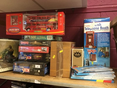 Lot 605 - Box of jigsaws, and boxes of model trains etc