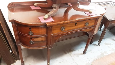 Lot 1129 - George III mahogany bowfront sideboard