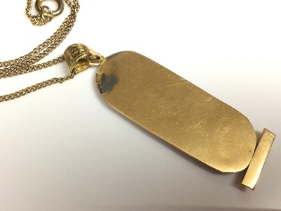 Lot 1 - Egyptian gold pendant on gilt metal chain, 45.5cm long